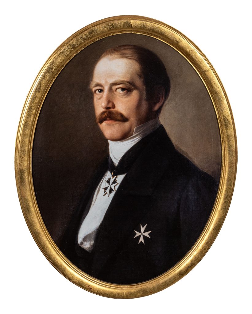 Bismarck als Bundestagsgesandter, 1858, mit Halsdekoration und Brustkreuz eines Ehrenritters der Johanniterordens. Bild Von Jakob Becker, Gemeinfrei,